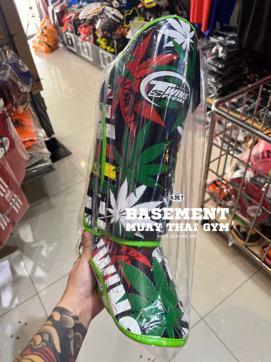Thailand's new Twins Grass Cowhide Muay Thai Boxing Sanda Protective Shin Guards are unisex