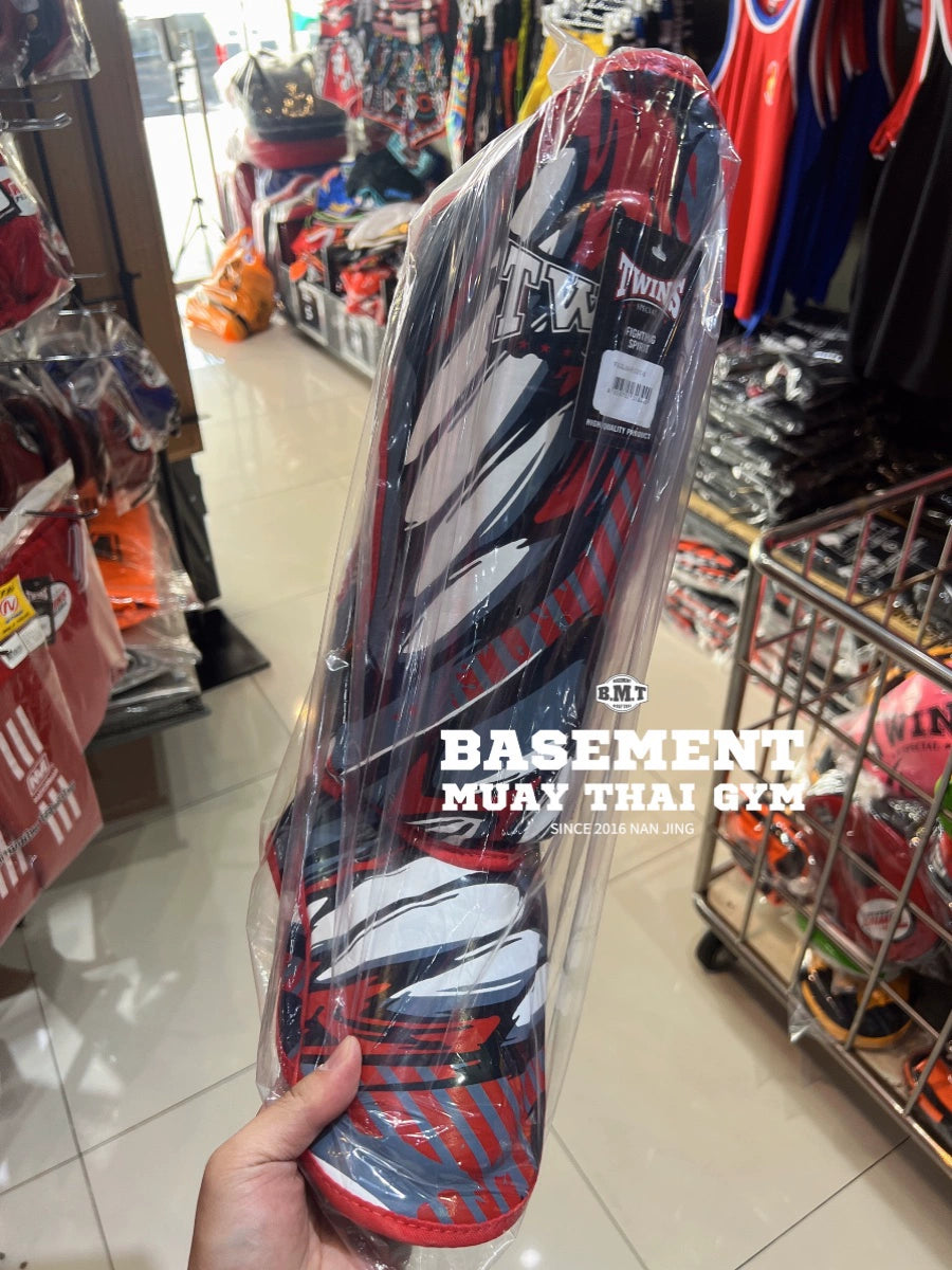 Thailand's new Twins Demon Cowhide Muay Thai Boxing Sanda Protective Plate Leggings are unisex